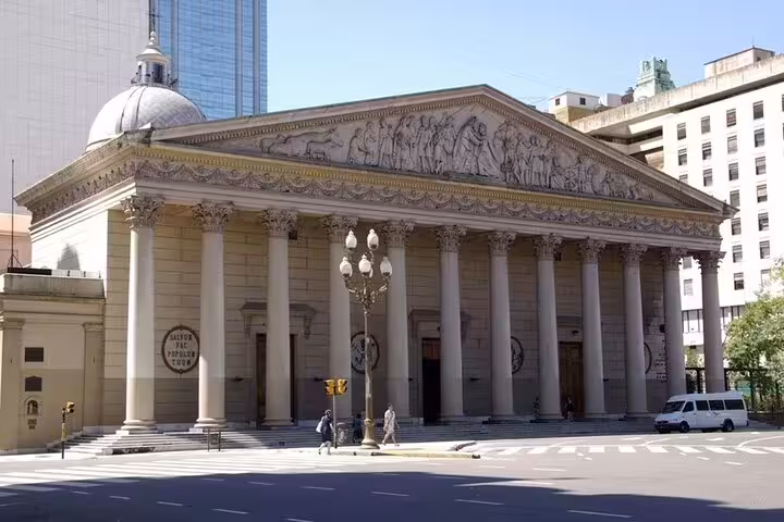 Buenos Aires full day sightseeing tour at Teatro Colón, iconic neoclassical facade with columns in downtown
