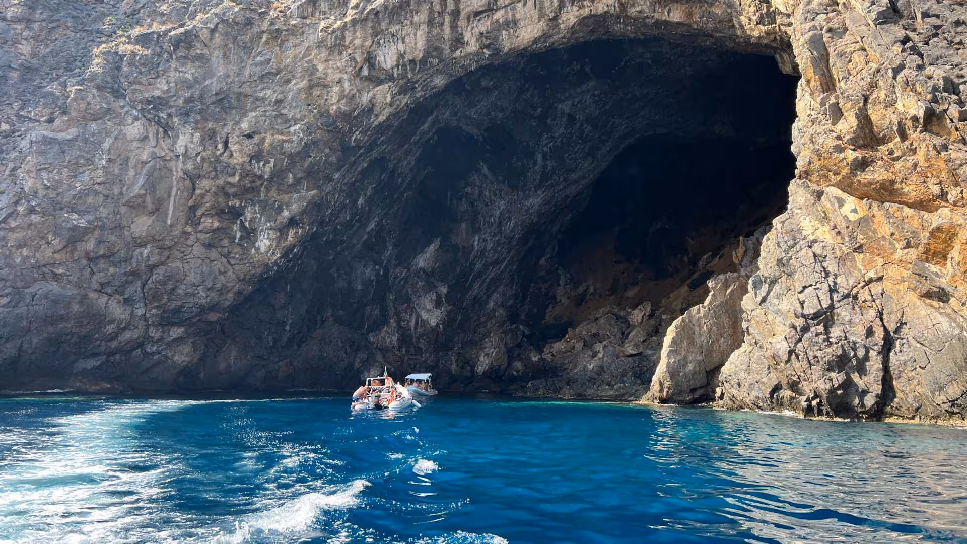 Discover the majestic sea cave entrance on a Buggerru dinghy tour to Pan di Zucchero and Porto Flavia.
