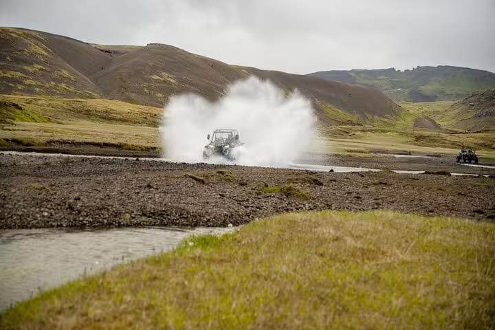 Buggy splashing through a river crossing in Iceland's Hengill highlands during a 2-hour adventure tour