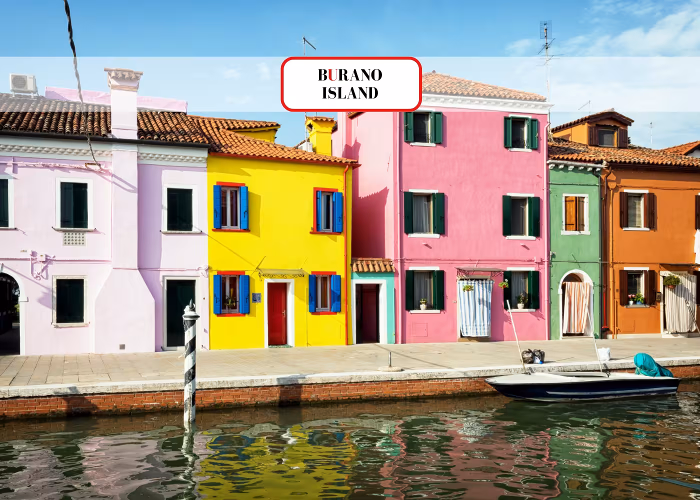 Vibrant colorful houses along Burano canal, highlighting picturesque scenery on Venice Islands guided cruise tour.