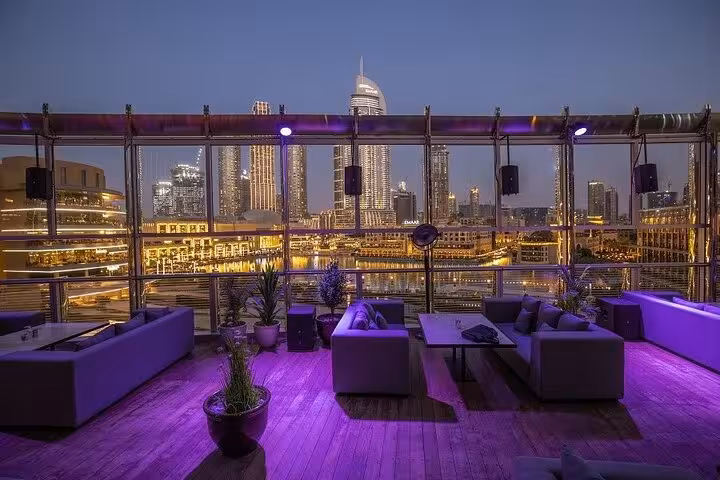 Rooftop lounge dinner with Dubai skyline views, perfect add-on to Burj Khalifa tickets and meal package