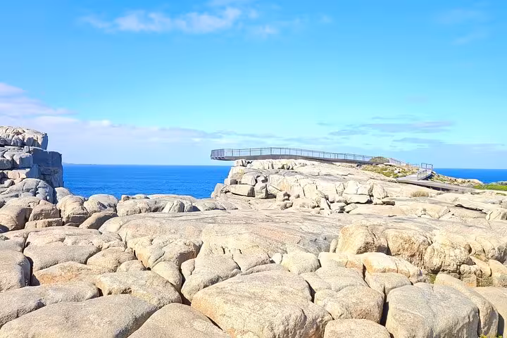 Scenic rocky landscape with ocean views from a lookout point on the Busselton Jetty to Valley of the Giants tour.