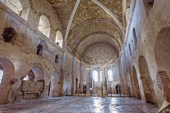 Interior of ancient Byzantine basilica ruins in Turkey, vaulted brick arches on 13-day private guided history tour