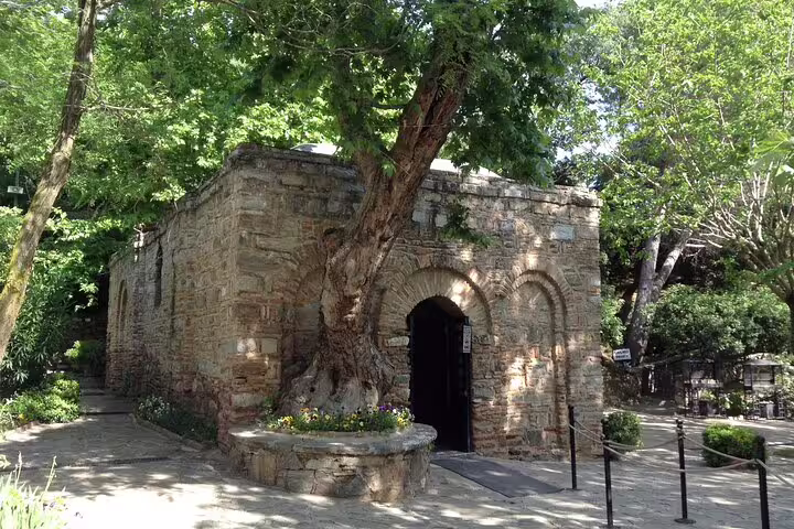 Stone Byzantine church in Istanbul garden shade, serene stop on Ephesus & Istanbul combined 2 tours itinerary
