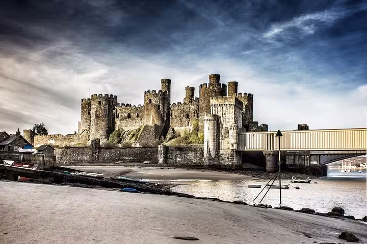 Caernarfon Castle on the Menai Strait, a highlight of the Portmeirion, Castles and Snowdonia tour