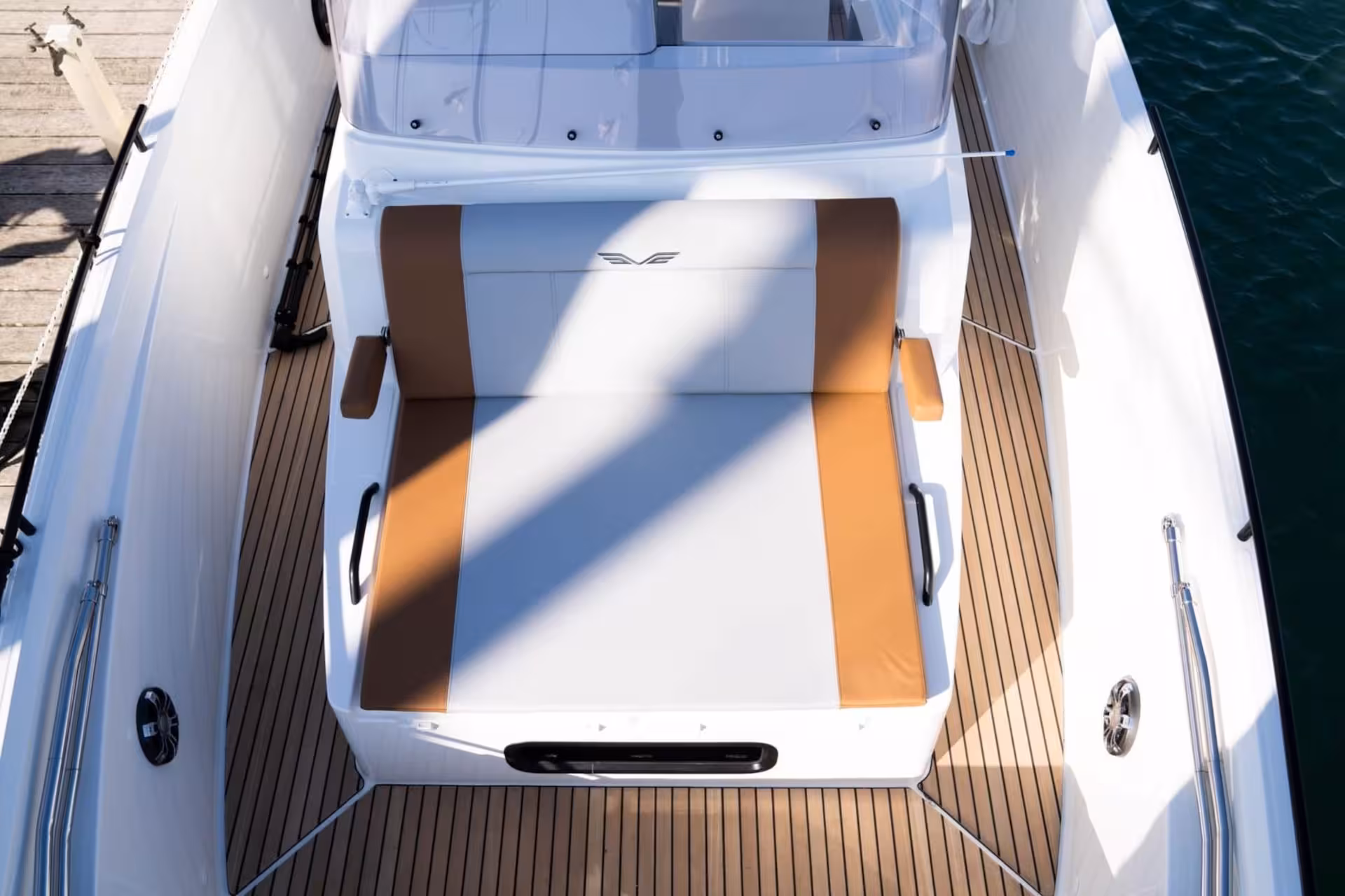 Stylish cushioned seating area on a boat, offering relaxation during a Cagliari 3-hour boat tour.