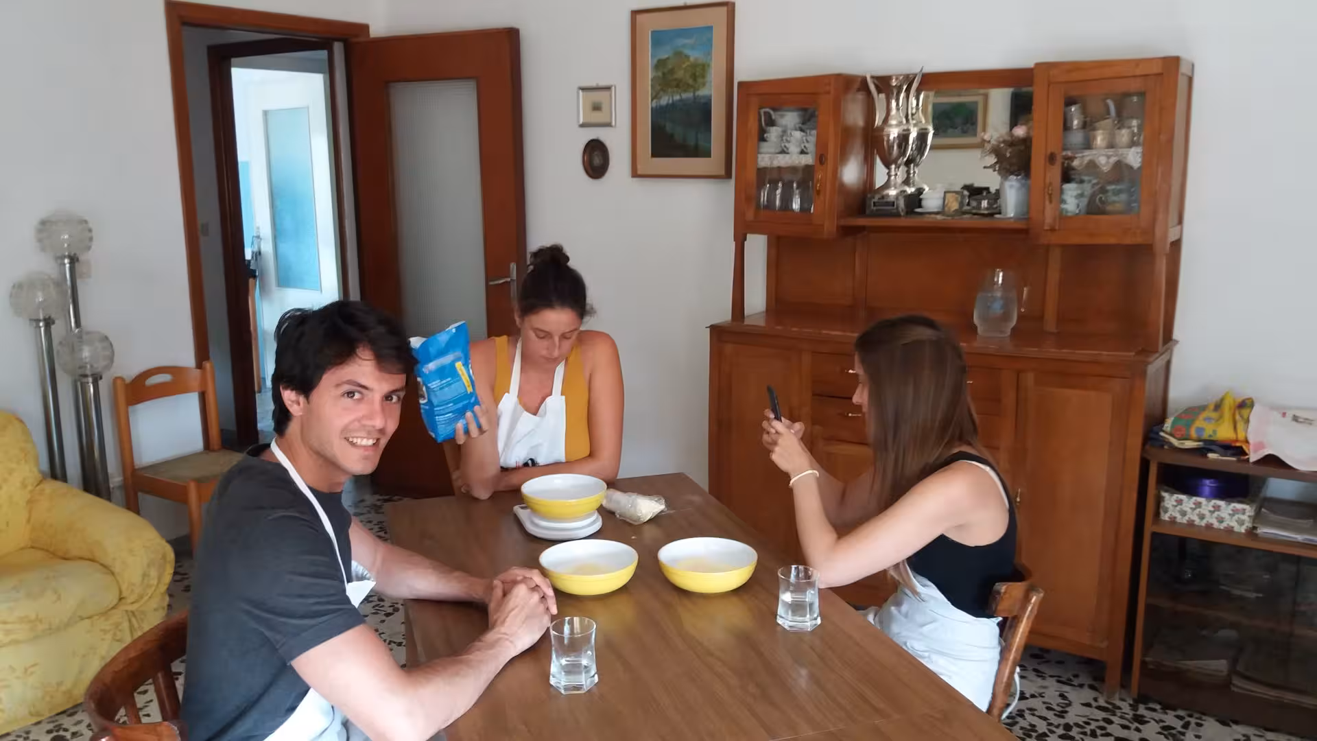 Guests enjoy a hands-on experience preparing ingredients in a Cagliari culurgiones cooking class.