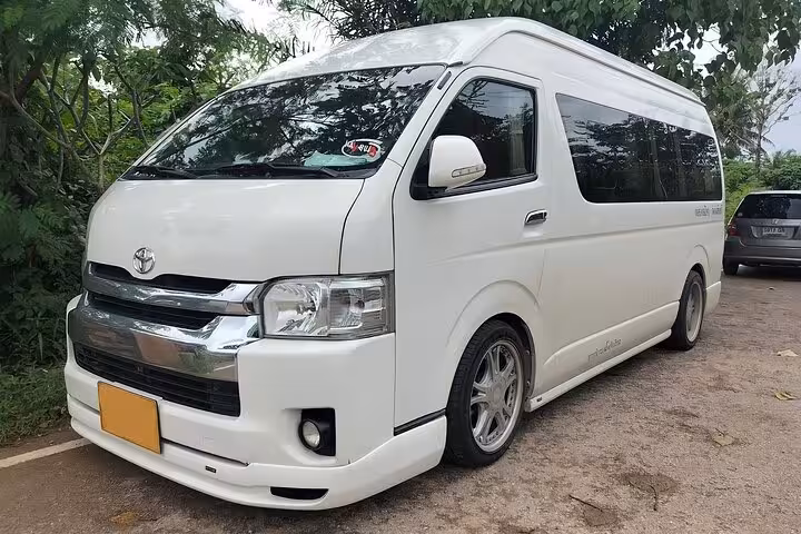 White private minivan for Cairo Airport arrival and departure transfer, ideal for families and groups