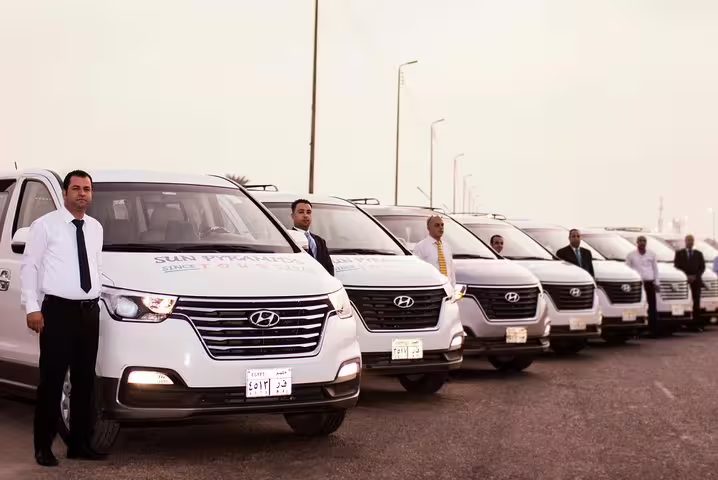 Fleet of private Cairo Airport transfer SUVs with professional drivers for reliable pickup and drop-off