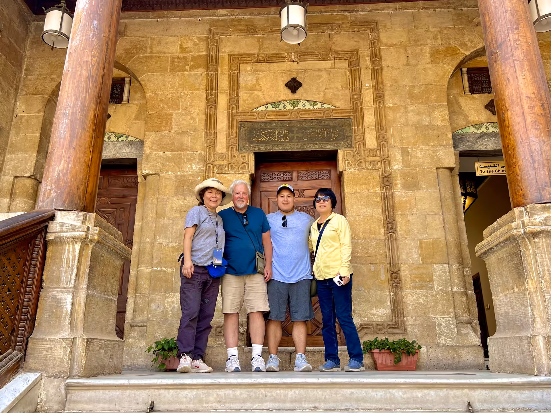 Travelers at historic mosque entrance in Cairo Citadel on 4-day private tour Cairo Giza Alexandria Fayoum
