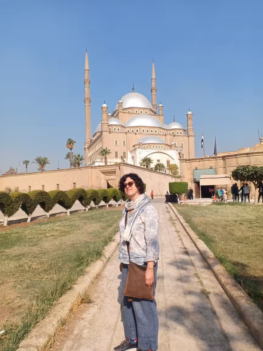 Traveler walking toward Mosque of Muhammad Ali at Saladin Citadel, highlighting a Cairo Citadel of Saladin tour