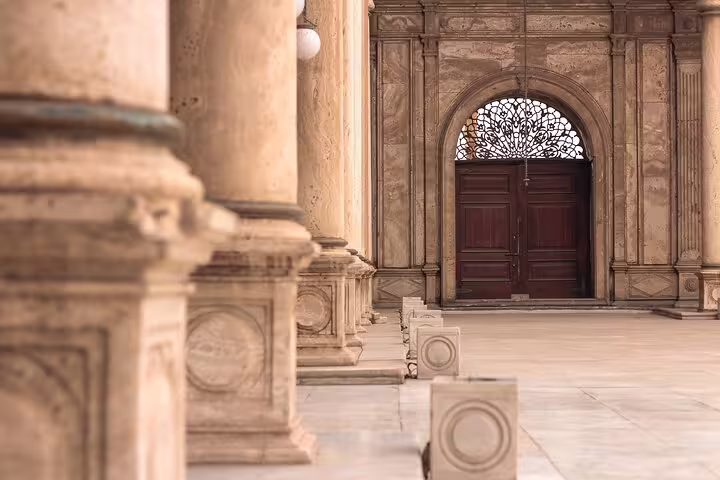 Stone colonnade and ornate arched doorway at Cairo Citadel on a private Old Cairo guided tour