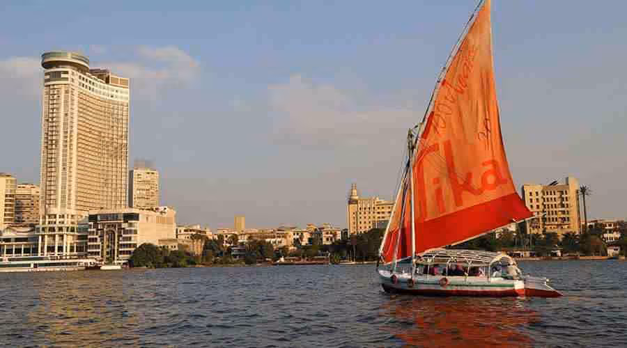 Traditional felucca sailboat on the Nile in Cairo, scenic add-on to Khan el Khalili shopping and Koshary lunch