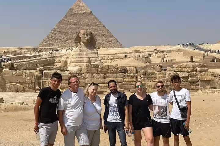 Group photo at Great Sphinx and Pyramid of Khafre, Giza, on 3-day Cairo Giza Alexandria private tour