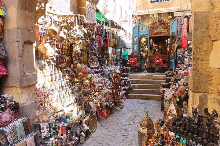 Souvenir stalls in Cairo Khan el Khalili Market bazaar on guided shopping tour with koshary lunch