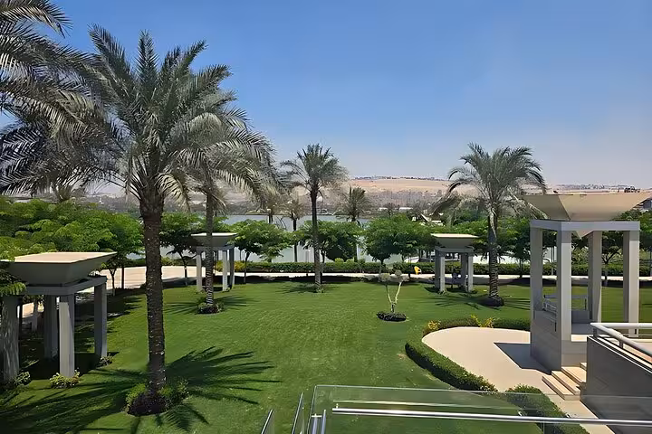 Palm-lined gardens at Cairo National Museum of Egypt, included with QR ticket access for easy entry