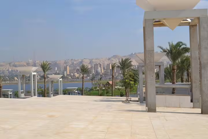 Panoramic terrace view near Cairo National Museum with Nile and palm trees, part of Egyptian Museum and Citadel tour