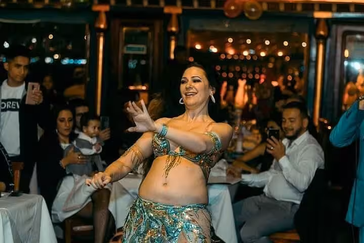 Belly dance show during Cairo evening Nile dinner cruise with private transfer and onboard dining