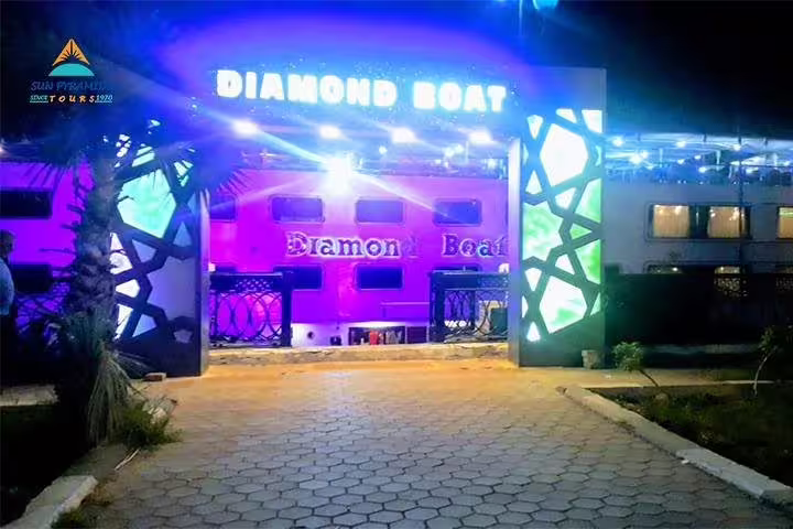 Diamond Boat entrance lit up at night for Cairo Nile dinner cruise and show, boarding point for evening river tour