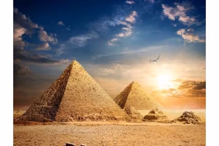 Sunset view of the Great Pyramids of Giza on a private Cairo one day tour from Hurghada with transfers