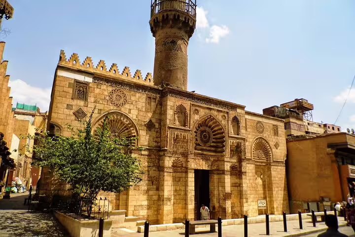 Historic Al-Aqmar Mosque facade in Islamic Cairo, included in a 2-day Cairo short break city tour