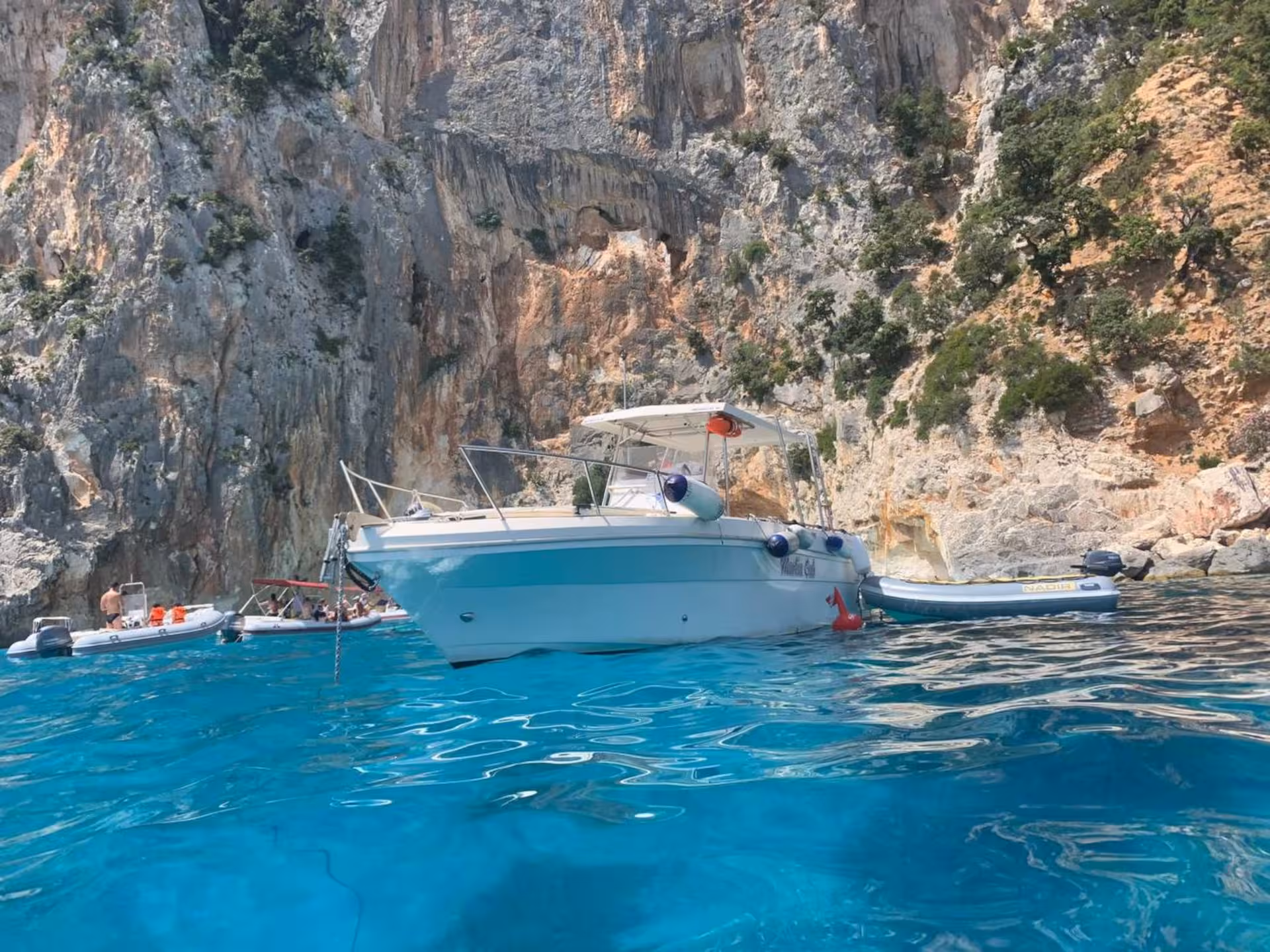Experience a scenic boat tour from Cala Gonone in the Gulf of Orosei with stunning coastal views and azure waters.