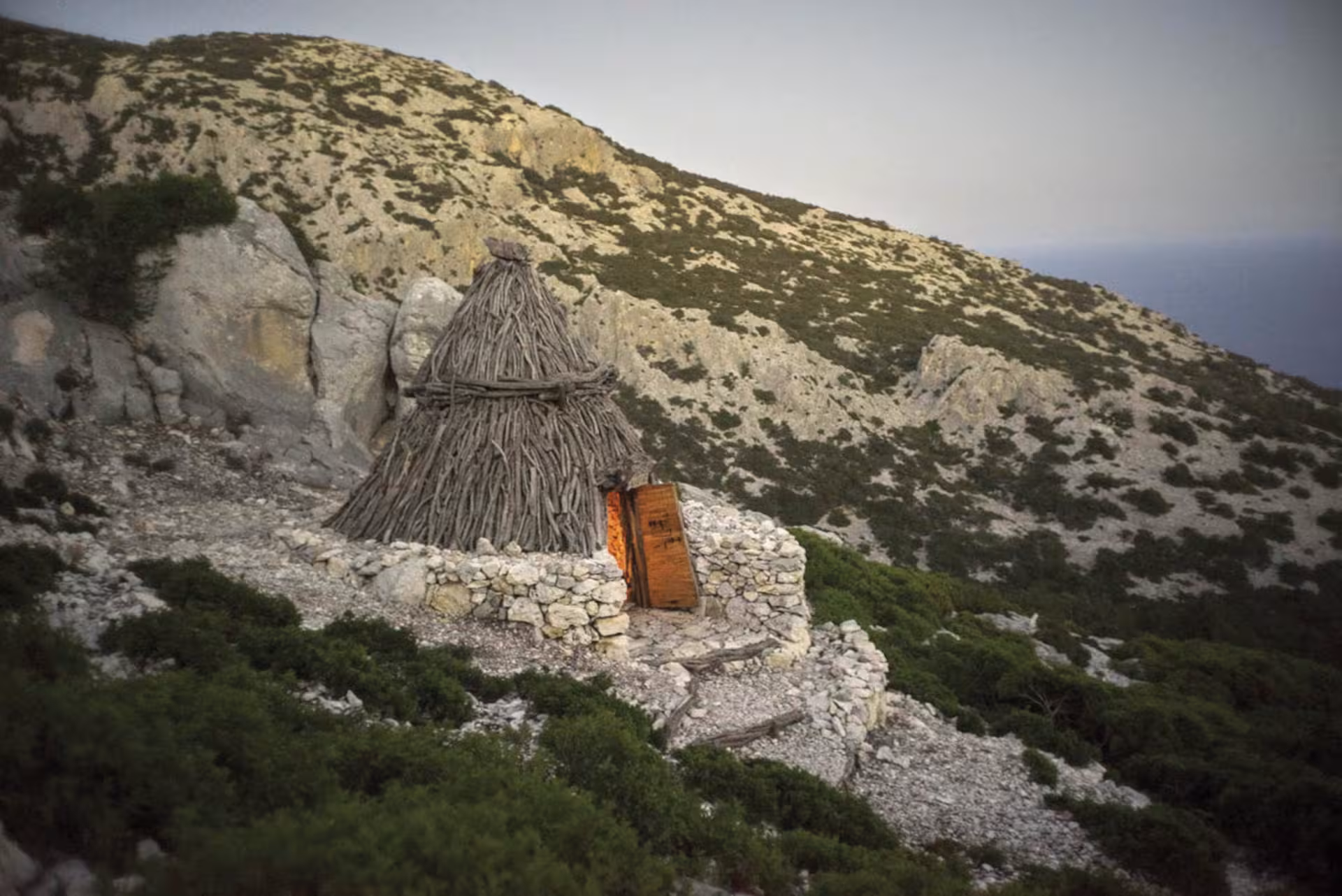 Traditional shepherd's hut nestled in the rocky landscape of Supramonte during a Cala Gonone Jeep tour.
