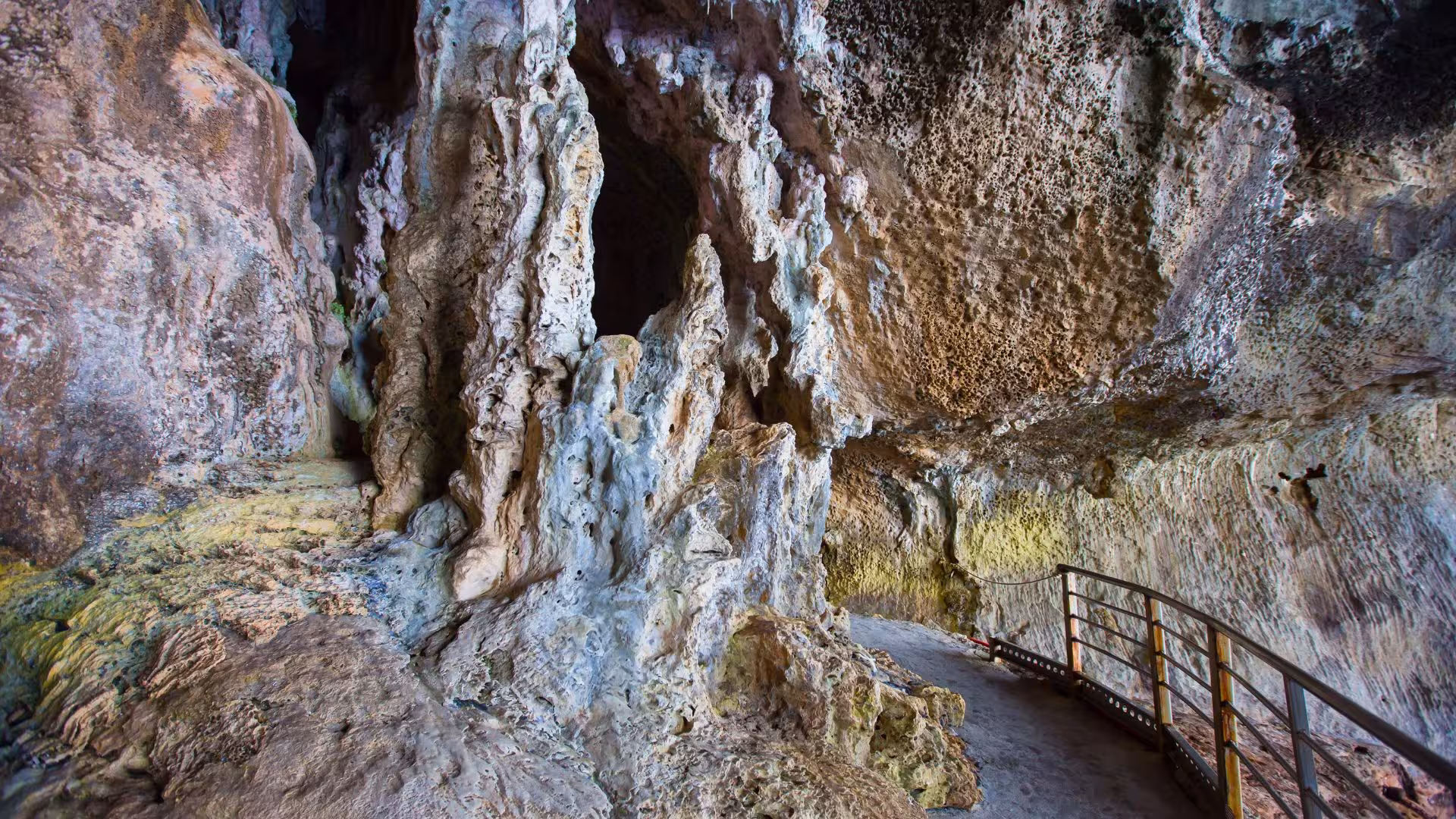 Marvel at the intricate rock formations along the scenic pathways of Bue Marino Caves on a Cala Gonone motorboat adventure.