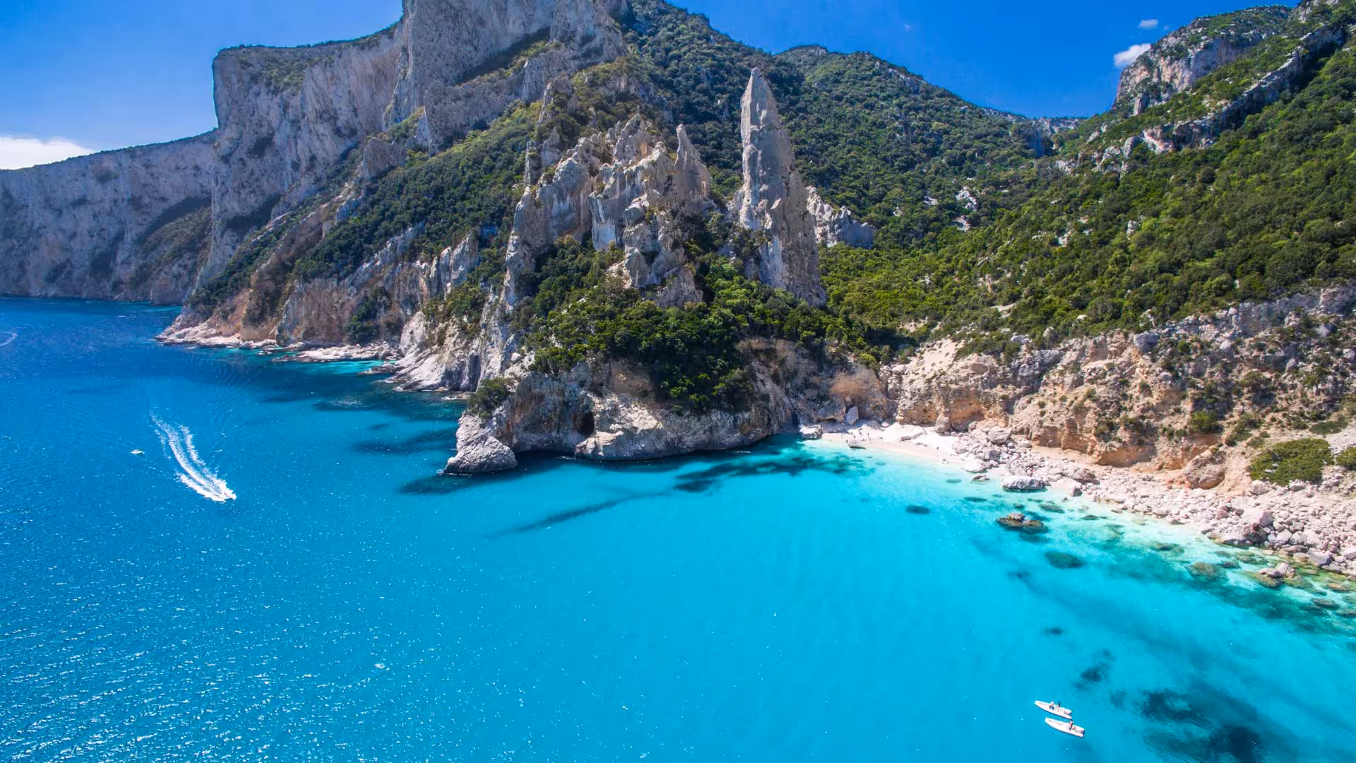 Dramatic cliffs and turquoise sea in the Gulf of Orosei, perfect for a scenic Cala Gonone sailing tour.