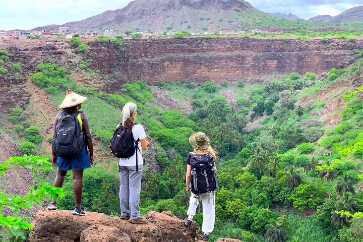 Hikers overlooking lush Calabaceira Valley on Santiago Island, Cape Verde, on a 4-hour guided trek to Cidade Velha