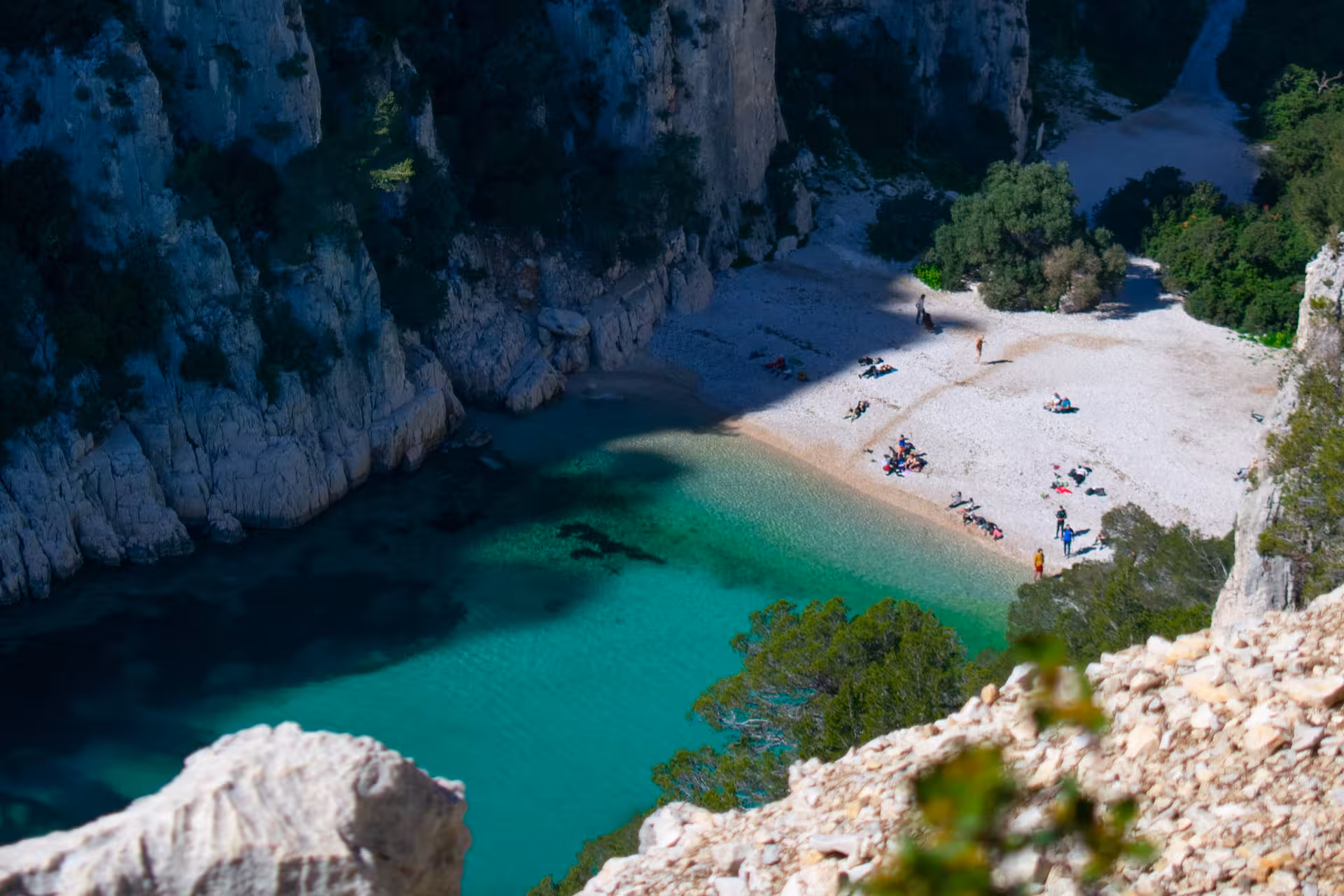 Aerial view of turquoise Calanques cove and beach on Luminy hiking trail, Calanques National Park near Marseille