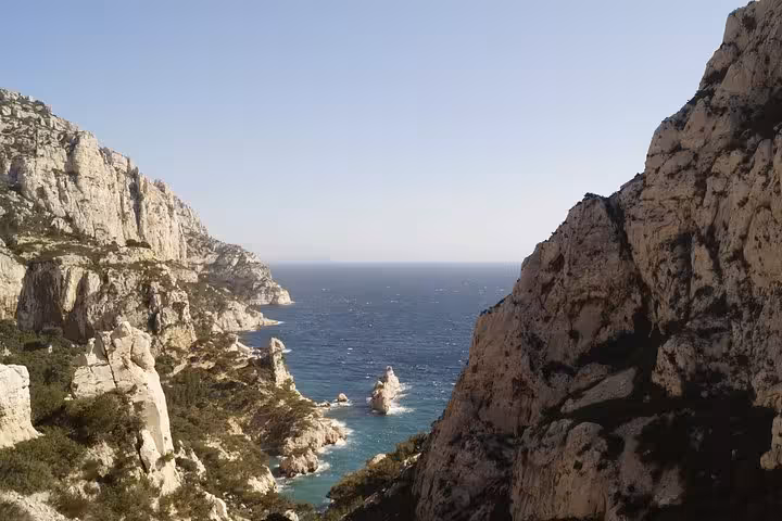 Panoramic view of limestone cliffs and Mediterranean sea on a Calanques National Park hike from Marseille