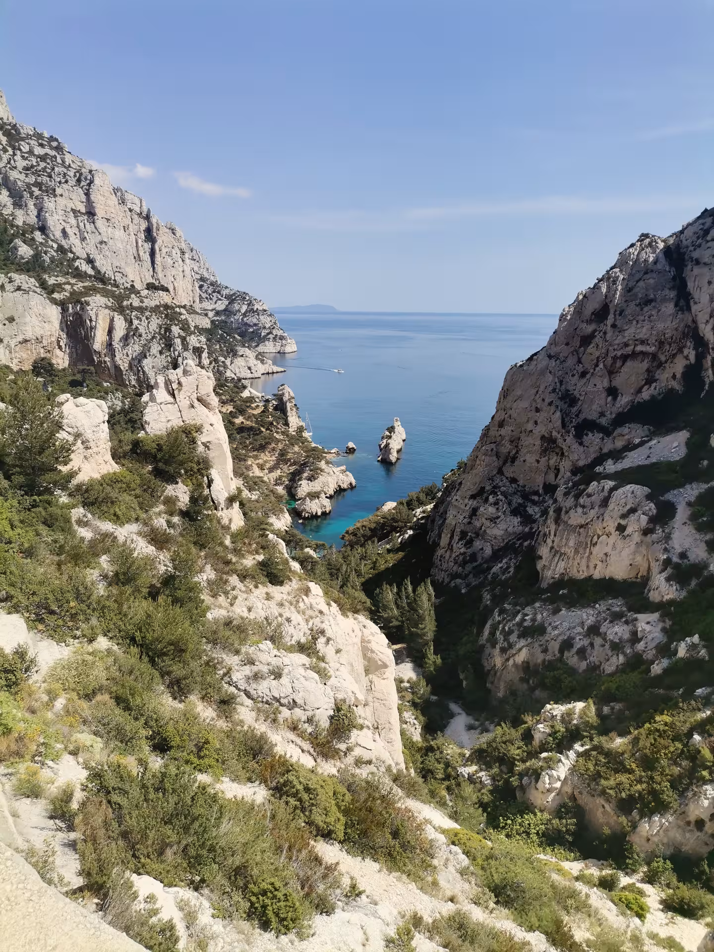 Calanques National Park cliffs above turquoise Mediterranean cove on Provence hiking tour near Marseille