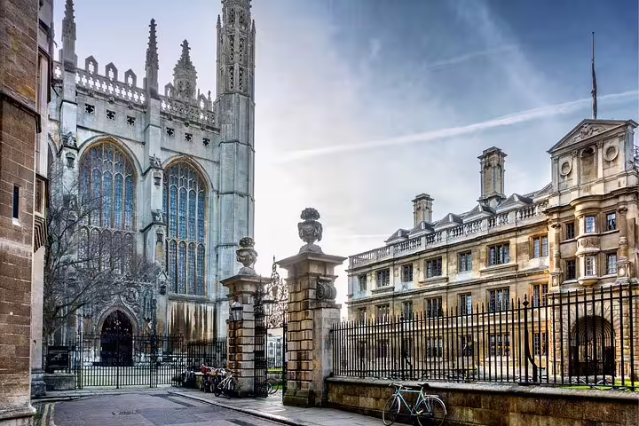 Cambridge college courtyard and chapel gates, ideal clue spot on a self-guided scavenger hunt highlights tour