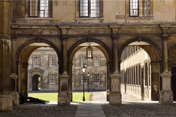 Historic stone archways and courtyard of a Cambridge university college building