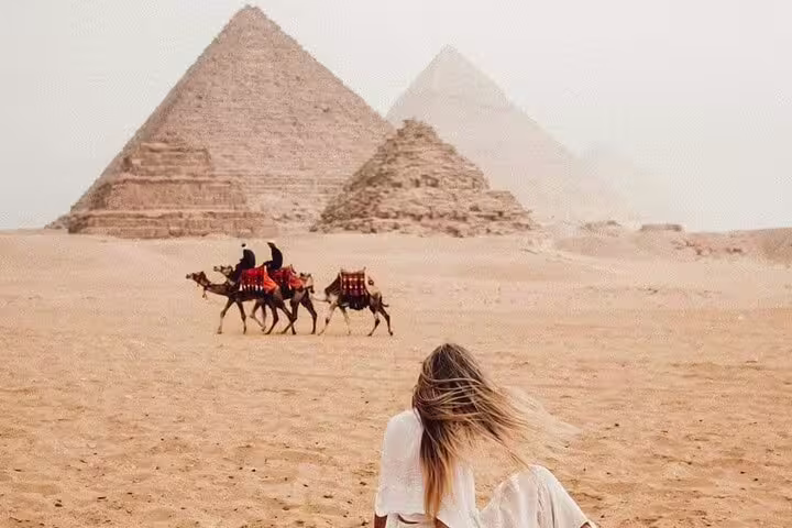 Camel ride across Giza desert with pyramids view, Cairo sightseeing on 2-day Luxor to Cairo flight tour