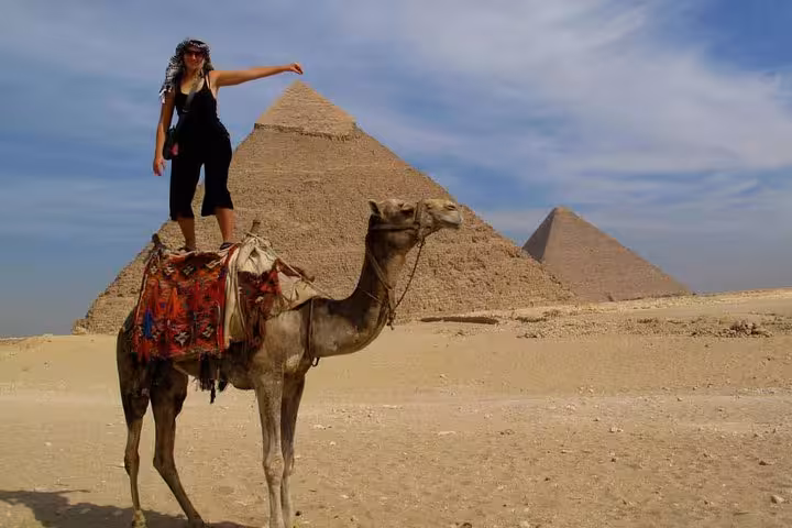 Camel ride at Giza Pyramids near Cairo, popular excursion included in Hurghada 3-day tour program
