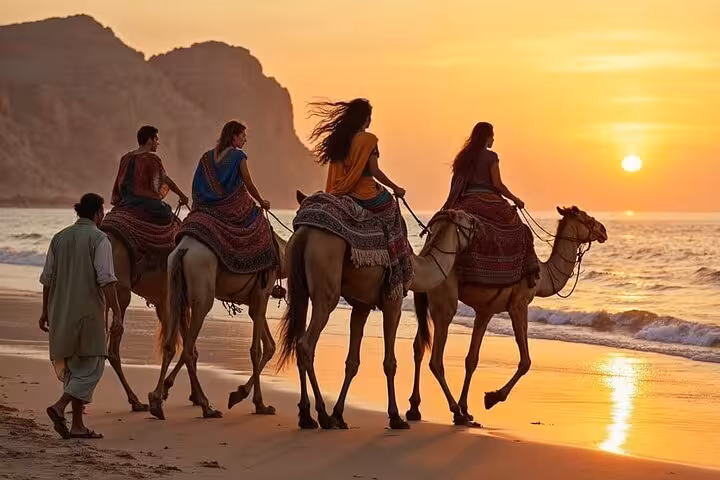 Camel ride at sunset on Dahab beach, part of the Sharm El-Sheikh jeep adventure to Blue Hole and canyon