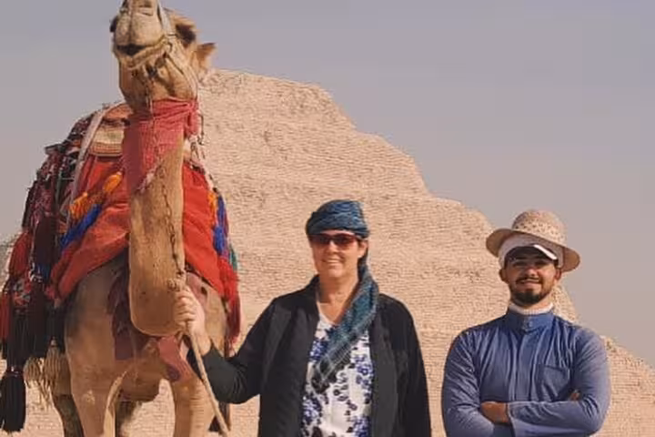 Camel photo stop at Saqqara near Step Pyramid on private Cairo tour including Memphis, GEM and lunch