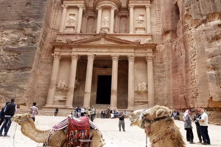 Camels and tourists at Petra Treasury, Jordan on 13-day Egypt Jordan and Jerusalem guided tour