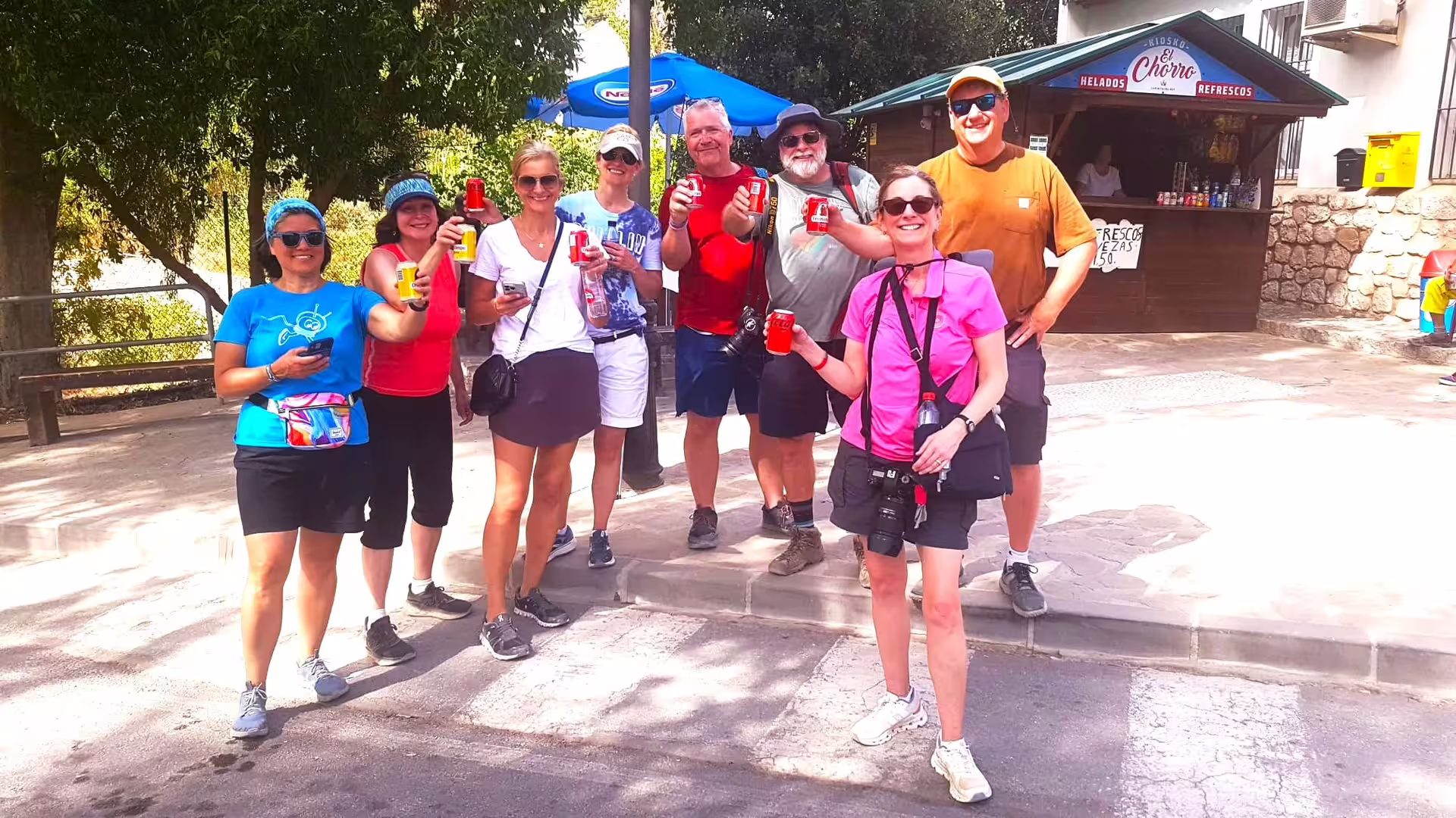 Caminito del Rey group walking tour guests celebrating at El Chorro kiosk before the guided hike in Malaga