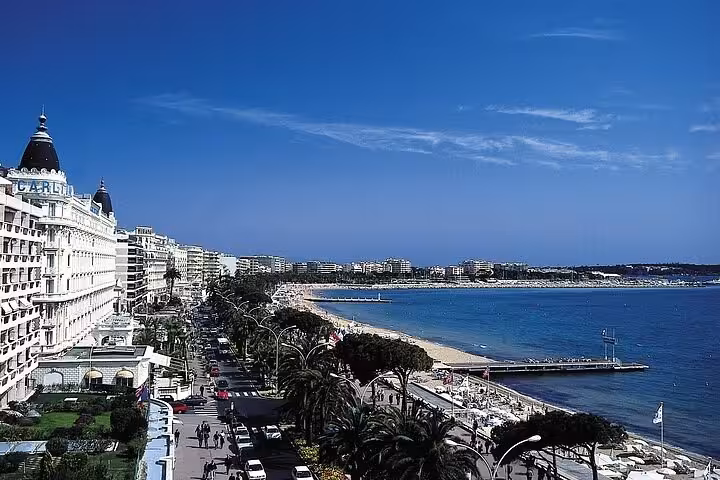 Aerial view of Cannes beachfront promenade with Carlton Hotel and French Riviera coastline