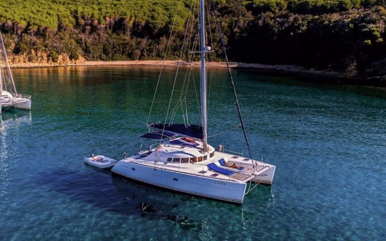 Discover the pristine beauty of La Maddalena Archipelago from a comfortable catamaran tour departing Cannigione.
