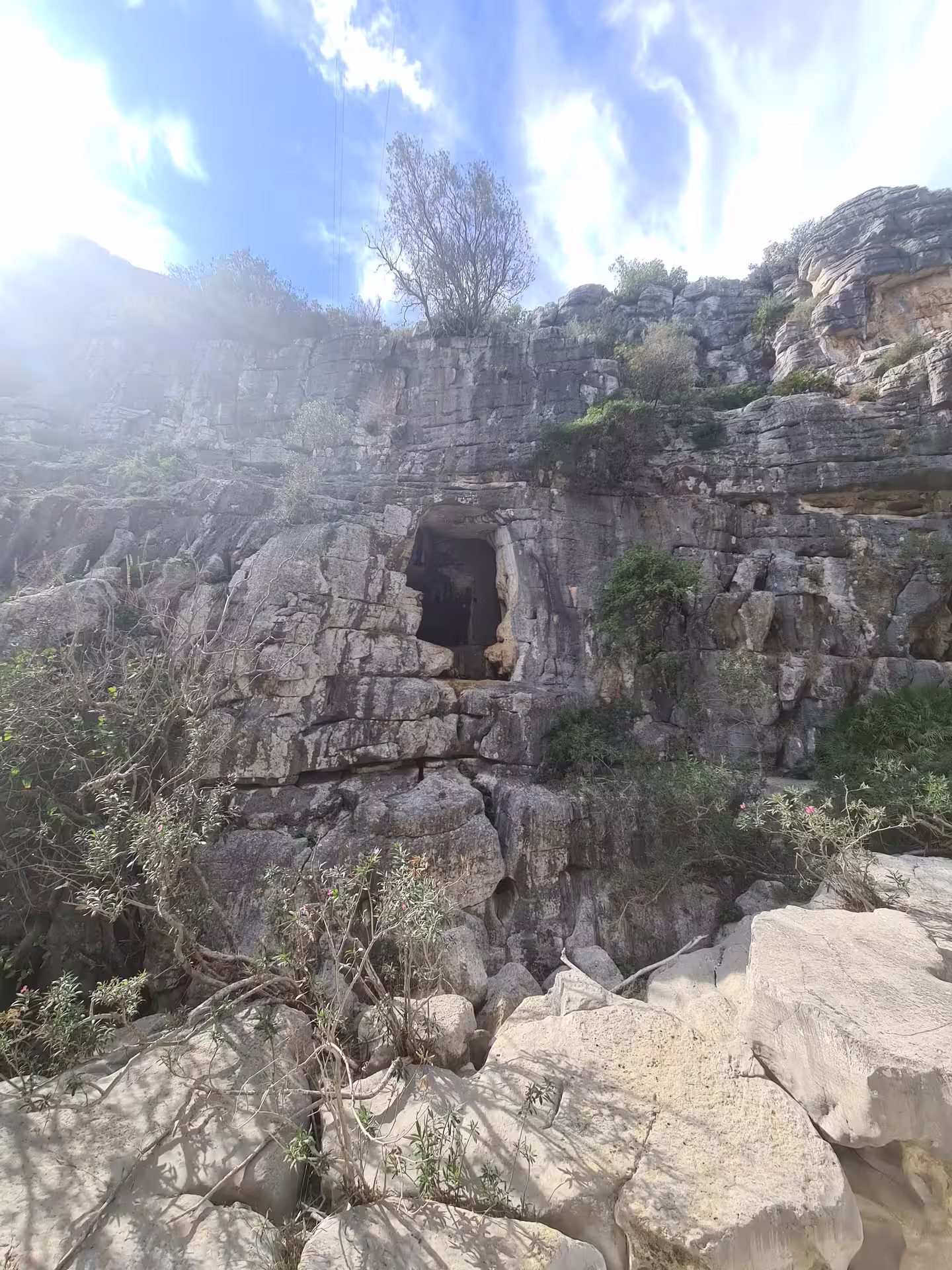 Scenic view of Canuto de la Utrera's rocky cliffs under a vibrant blue sky during a private hiking tour.
