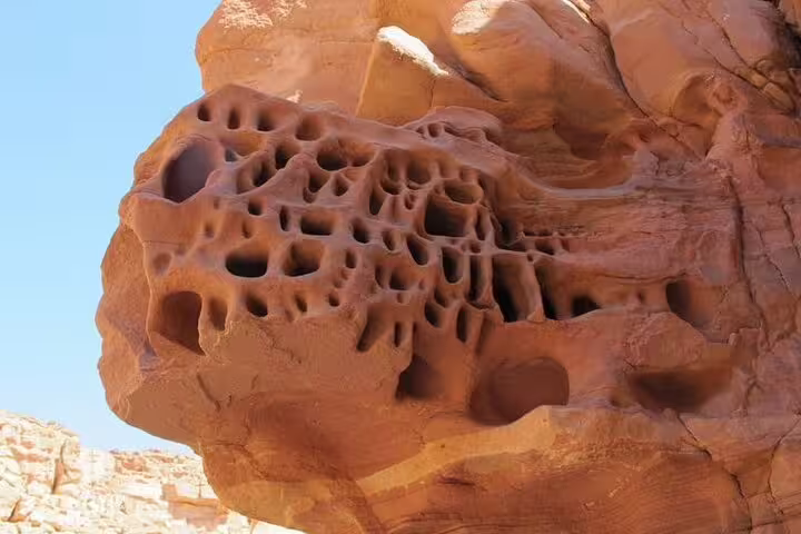 Honeycomb sandstone rock formation at Canyon Salama on jeep safari tour from Sharm El Sheikh to Dahab