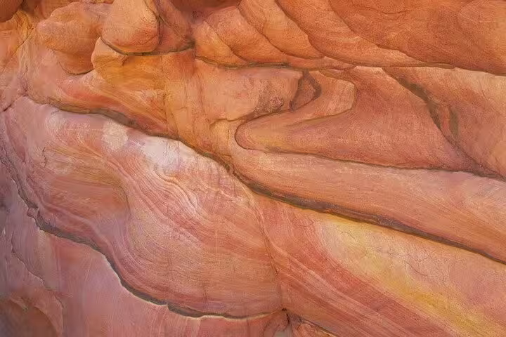 Close-up of colorful layered sandstone in Canyon Salama, a highlight of the Sharm el Sheikh to Dahab jeep safari