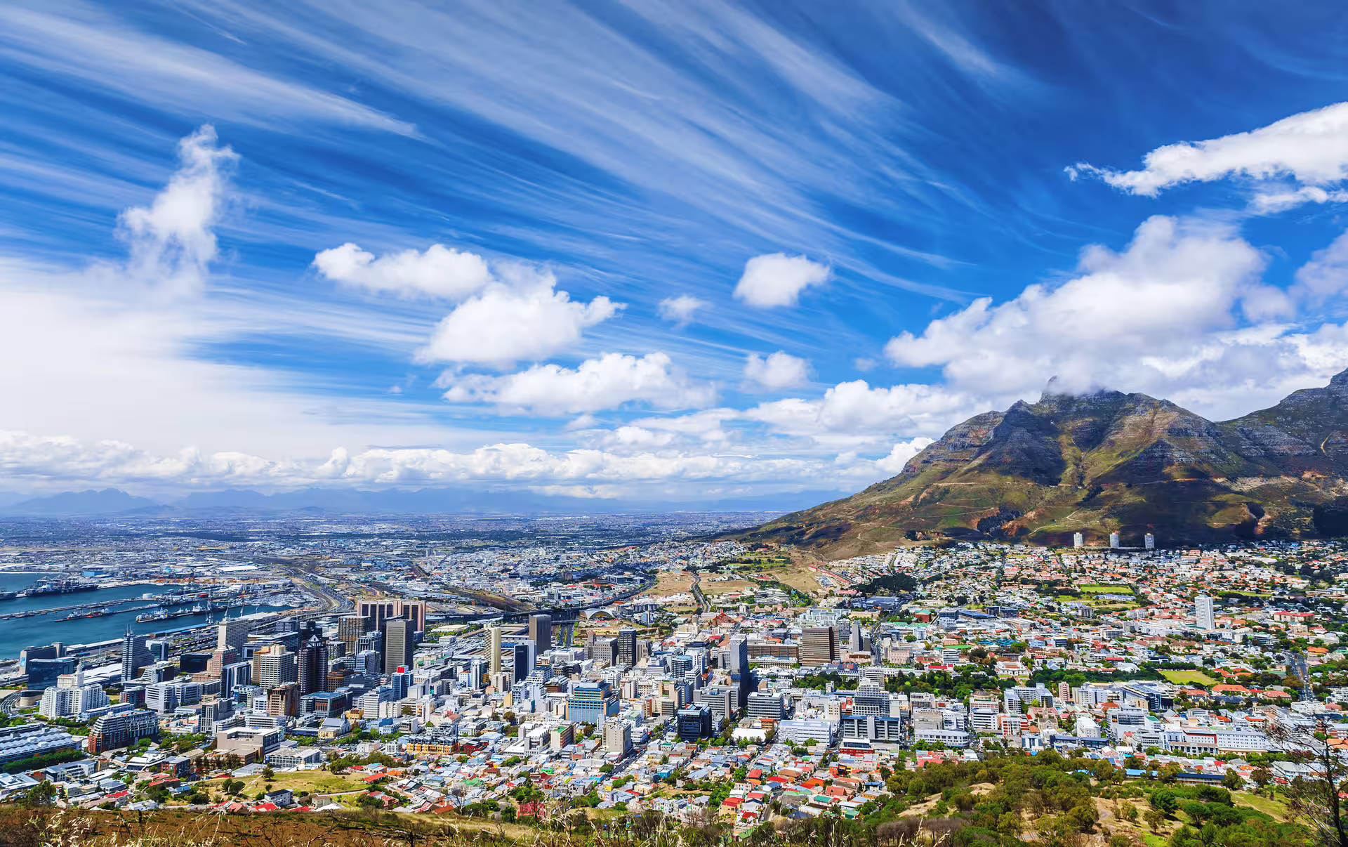Aerial view of Cape Town with Table Mountain, showcasing the stunning landscape for the Private Helicopter Cape Point Tour.