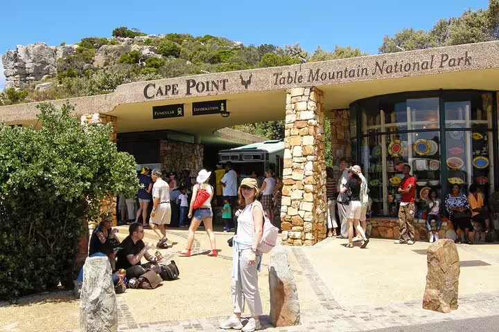 Visitors gather at the entrance of Cape Point in Table Mountain National Park during a scenic day tour from Cape Town.