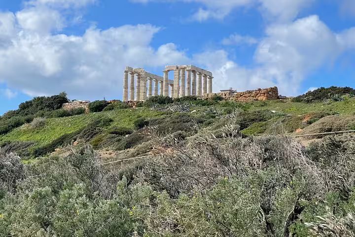 Temple of Poseidon on Cape Sounio hilltop, scenic stop on Athenian Riviera private tour from Athens