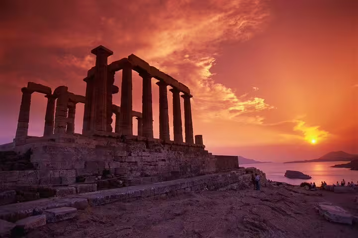 Golden hour at Cape Sounio with the Temple of Poseidon silhouetted, a top sunset stop on a private Athens tour